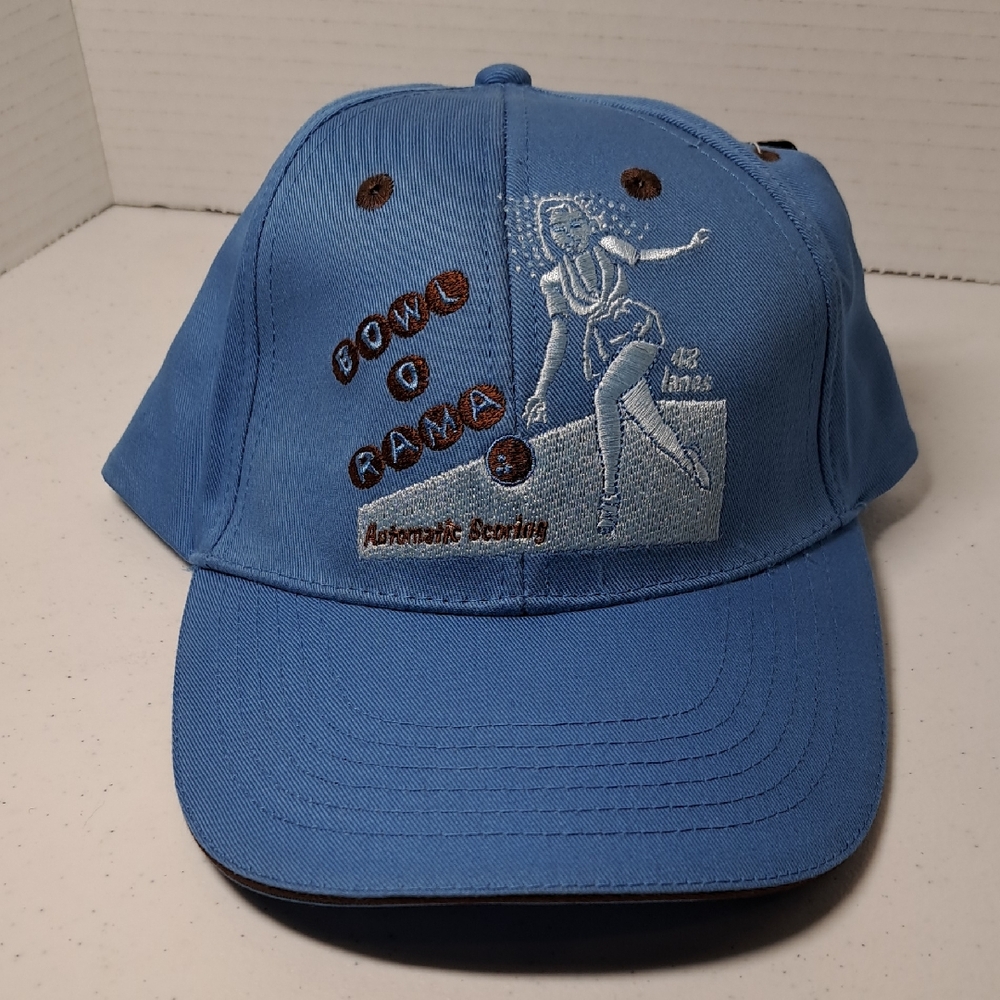 Light Blue Vintage Baseball Hat with A Retro Bowling Alley Embroidered Design.